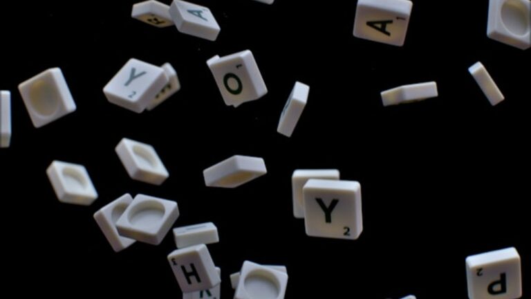 a jumble of scrabble letters flying in the air