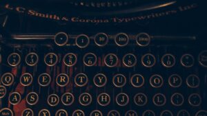 a close up of an old-fashioned typewriter keyboard