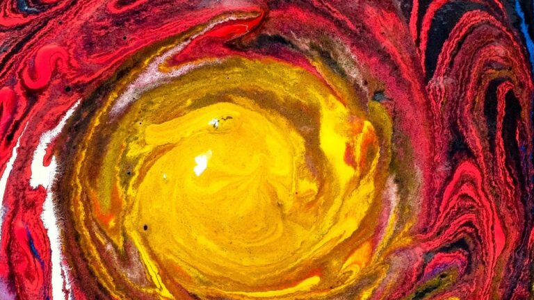 a colourful vortex, gold at the centre, red at the edges