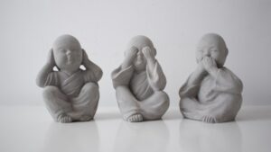 the small statues of babies doing the hear no evil, see no evil, speak on evil pose